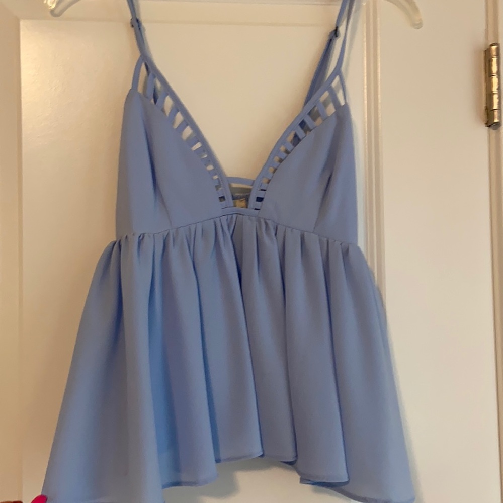 L’atiste by Amy. Baby blue empire waist top. New without tags. Size medium